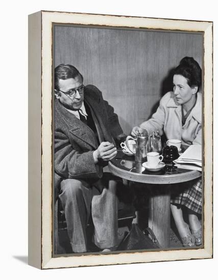 Philosopher Writer Jean Paul Sartre and Simone de Beauvoir Taking Tea Together-David Scherman-Framed Premier Image Canvas