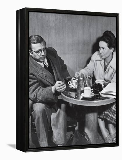 Philosopher Writer Jean Paul Sartre and Simone de Beauvoir Taking Tea Together-David Scherman-Framed Premier Image Canvas