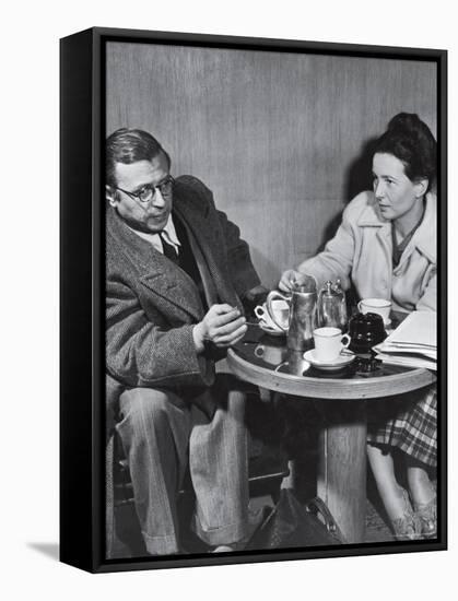 Philosopher Writer Jean Paul Sartre and Simone de Beauvoir Taking Tea Together-David Scherman-Framed Premier Image Canvas