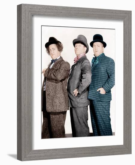 PHONY EXPRESS, from left: Larry Fine, Moe Howard, Curly Howard, (aka The Three Stooges), 1943-null-Framed Photo