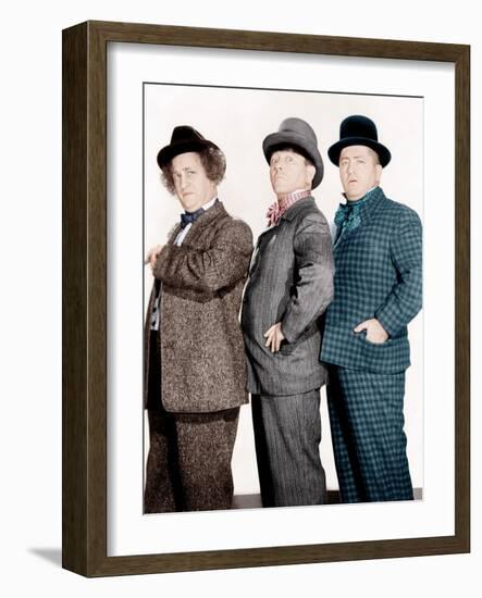 PHONY EXPRESS, from left: Larry Fine, Moe Howard, Curly Howard, (aka The Three Stooges), 1943-null-Framed Photo