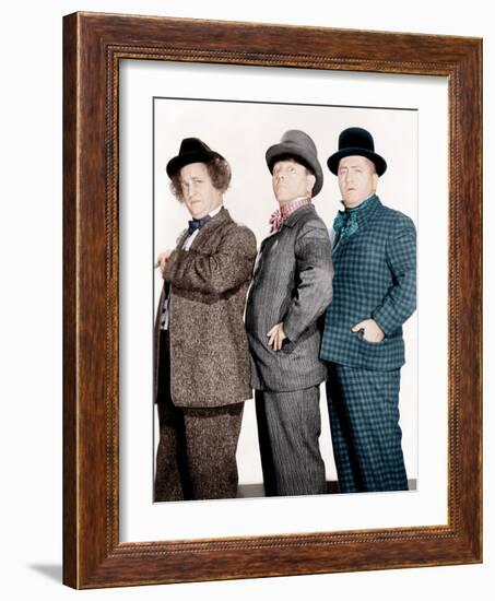 PHONY EXPRESS, from left: Larry Fine, Moe Howard, Curly Howard, (aka The Three Stooges), 1943-null-Framed Photo