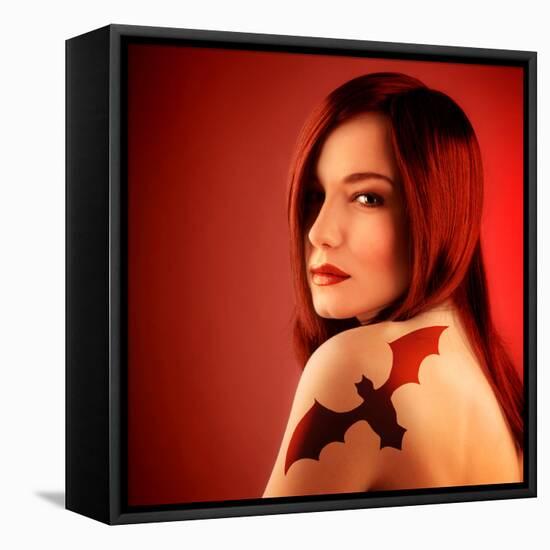 Photo of Beautiful Sexy Girl with Bat Tattoo on Shoulder Isolated on Red Background, Halloween Holi-Anna Omelchenko-Framed Premier Image Canvas