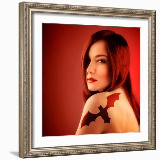 Photo of Beautiful Sexy Girl with Bat Tattoo on Shoulder Isolated on Red Background, Halloween Holi-Anna Omelchenko-Framed Photographic Print