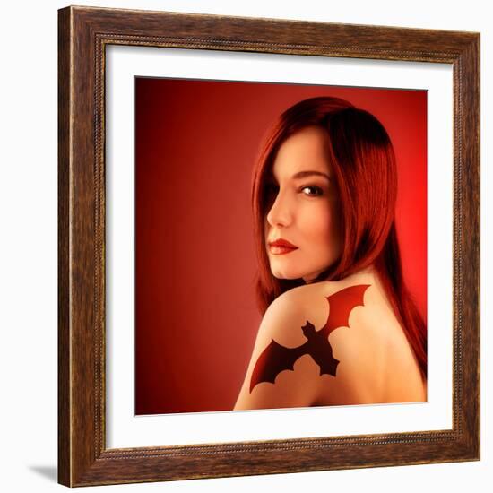 Photo of Beautiful Sexy Girl with Bat Tattoo on Shoulder Isolated on Red Background, Halloween Holi-Anna Omelchenko-Framed Photographic Print