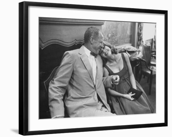 Photographer John Swope Sitting with Actress Jane Fonda During a Cocktail Party Given for Her-Allan Grant-Framed Premium Photographic Print