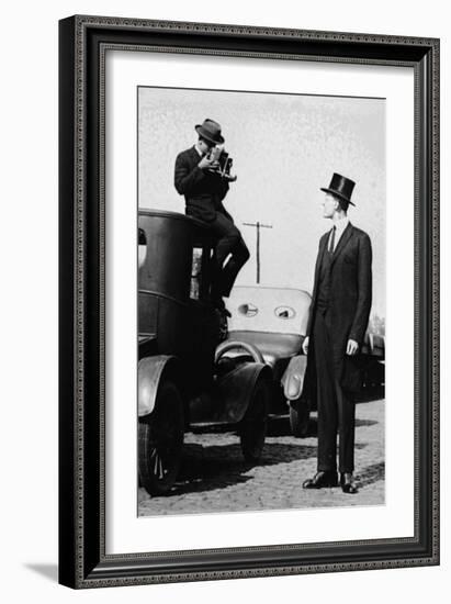 Photographer Mounts Himself on Roof of a Car to Shoot a Pictures of Exceedingly Tall Men in Top Hat-null-Framed Art Print