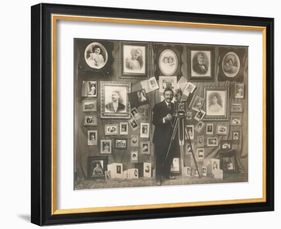 Photographer with his Work-null-Framed Art Print