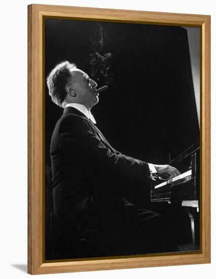Pianist Arthur Rubenstein at the Piano, Smoking Cigar-Gjon Mili-Framed Premier Image Canvas