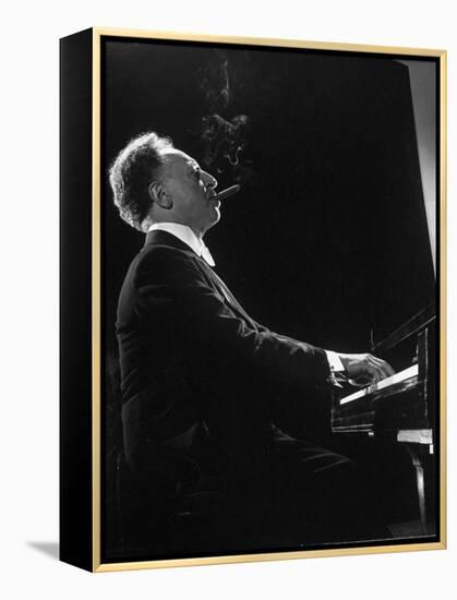 Pianist Arthur Rubenstein at the Piano, Smoking Cigar-Gjon Mili-Framed Premier Image Canvas