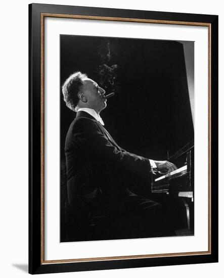 Pianist Arthur Rubenstein at the Piano, Smoking Cigar-Gjon Mili-Framed Premium Photographic Print