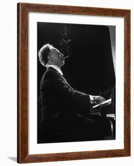 Pianist Arthur Rubenstein at the Piano, Smoking Cigar-Gjon Mili-Framed Premium Photographic Print