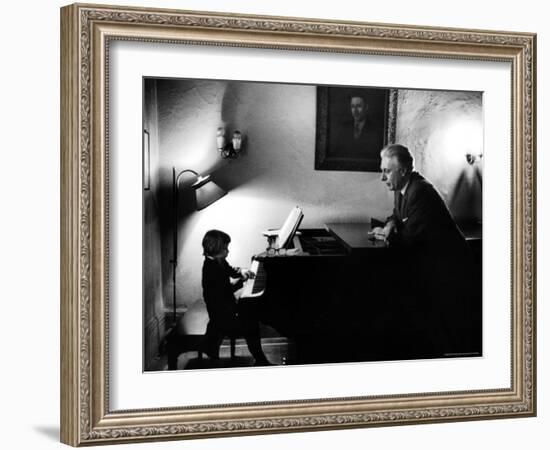 Piano Teacher Giving Lesson to Young Student in a Carnegie Hall Studio-Alfred Eisenstaedt-Framed Photographic Print