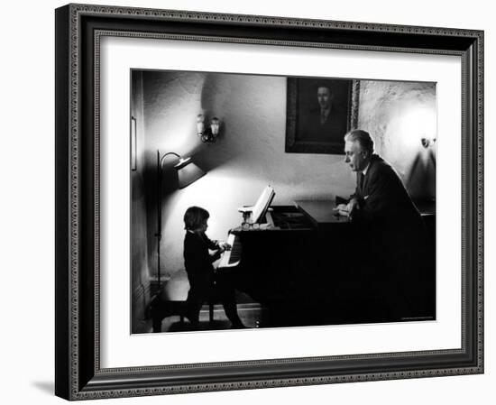 Piano Teacher Giving Lesson to Young Student in a Carnegie Hall Studio-Alfred Eisenstaedt-Framed Photographic Print