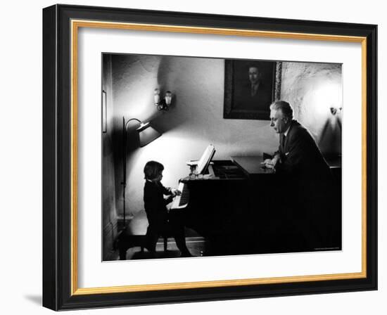 Piano Teacher Giving Lesson to Young Student in a Carnegie Hall Studio-Alfred Eisenstaedt-Framed Photographic Print