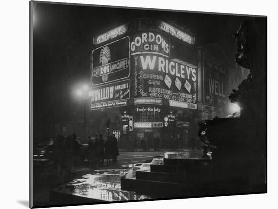 Piccadilly Circus London at Night, 1952-Associated Newspapers-Mounted Photo