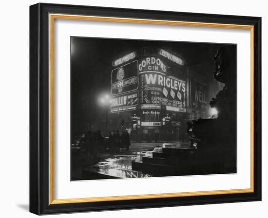 Piccadilly Circus London at Night, 1952-Associated Newspapers-Framed Photo