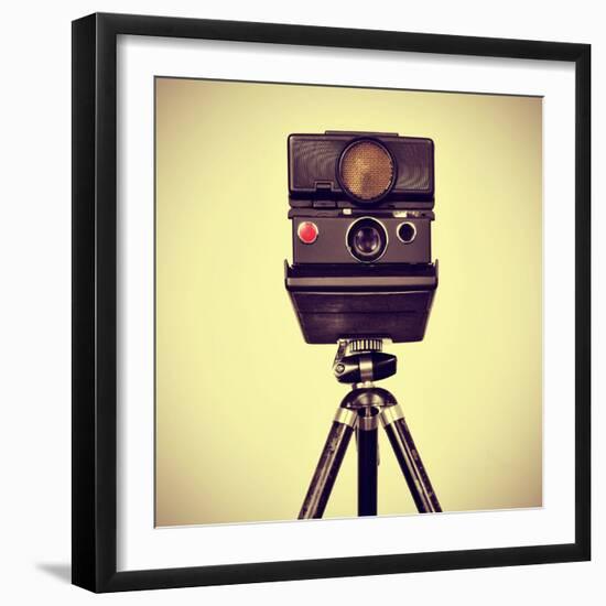 Picture of an Old Instant Camera in a Tripod with a Retro Effect-nito-Framed Photographic Print