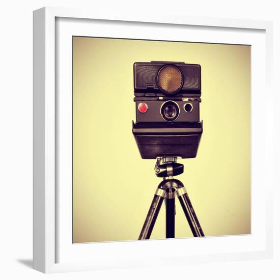 Picture of an Old Instant Camera in a Tripod with a Retro Effect-nito-Framed Photographic Print