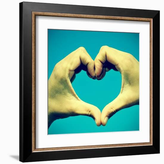 Picture Of Man Hands Forming A Heart Over The Blue Sky, With A Retro Effect-nito-Framed Art Print