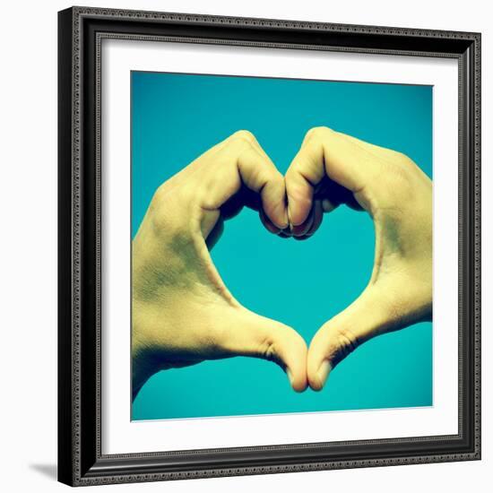 Picture Of Man Hands Forming A Heart Over The Blue Sky, With A Retro Effect-nito-Framed Art Print