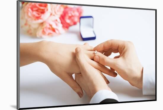 Picture of Man Putting Wedding Ring on Woman Hand-dolgachov-Mounted Photographic Print