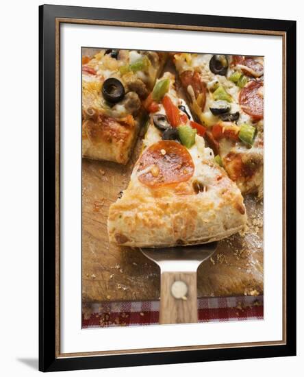 Piece of Pepperoni Pizza with Peppers and Olives on Server-null-Framed Photographic Print