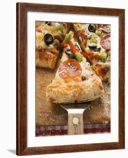 Piece of Pepperoni Pizza with Peppers and Olives on Server-null-Framed Photographic Print