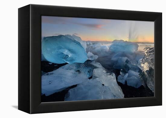 Pieces of glacial ice over black sand being washed by waves, Iceland-Raul Touzon-Framed Premier Image Canvas