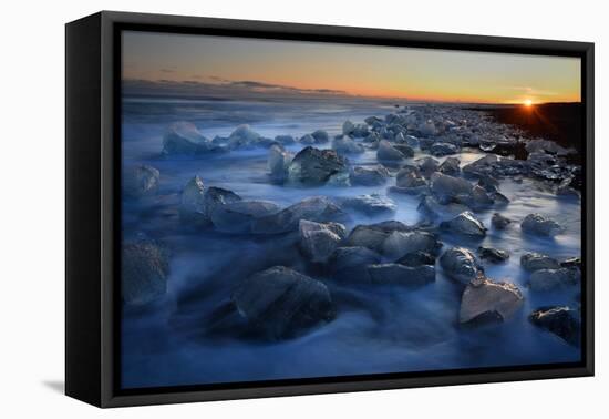 Pieces of glacial ice over black sand being washed by waves, Iceland-Raul Touzon-Framed Premier Image Canvas