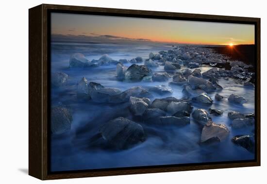 Pieces of glacial ice over black sand being washed by waves, Iceland-Raul Touzon-Framed Premier Image Canvas