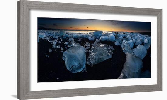 Pieces of glacial ice over black sand being washed by waves, Iceland-Raul Touzon-Framed Photographic Print