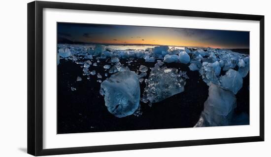 Pieces of glacial ice over black sand being washed by waves, Iceland-Raul Touzon-Framed Photographic Print