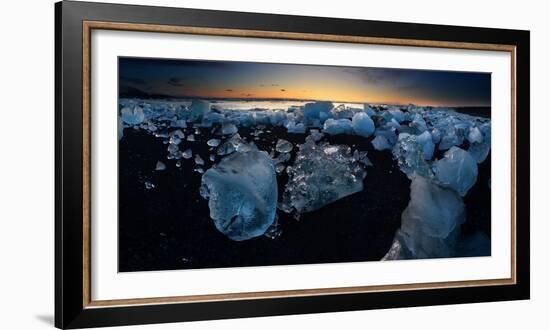 Pieces of glacial ice over black sand being washed by waves, Iceland-Raul Touzon-Framed Photographic Print