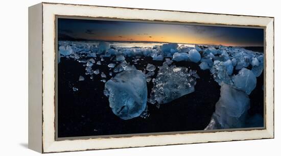 Pieces of glacial ice over black sand being washed by waves, Iceland-Raul Touzon-Framed Premier Image Canvas