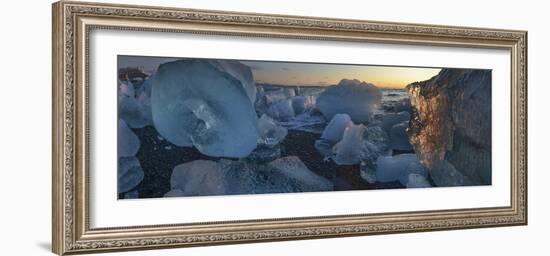 Pieces of glacial ice over black sand being washed by waves, Iceland-Raul Touzon-Framed Photographic Print