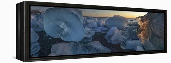 Pieces of glacial ice over black sand being washed by waves, Iceland-Raul Touzon-Framed Premier Image Canvas