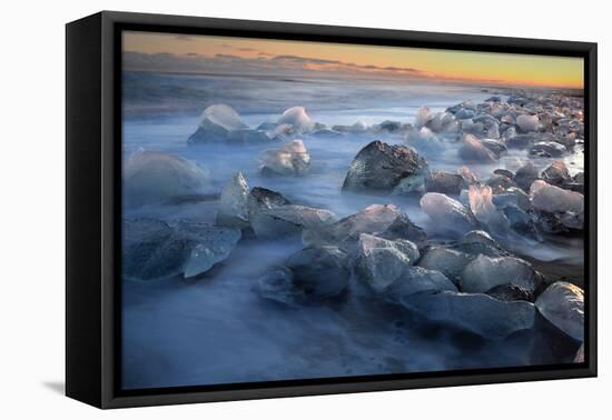 Pieces of glacial ice over black sand being washed by waves, Iceland-Raul Touzon-Framed Premier Image Canvas