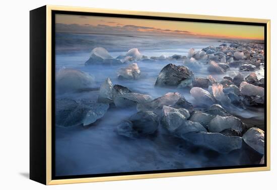 Pieces of glacial ice over black sand being washed by waves, Iceland-Raul Touzon-Framed Premier Image Canvas