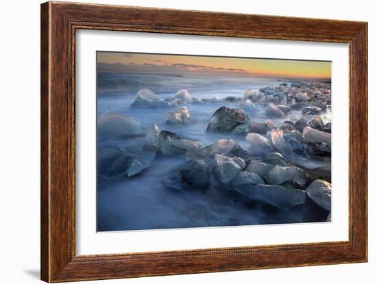 Pieces of glacial ice over black sand being washed by waves, Iceland-Raul Touzon-Framed Photographic Print