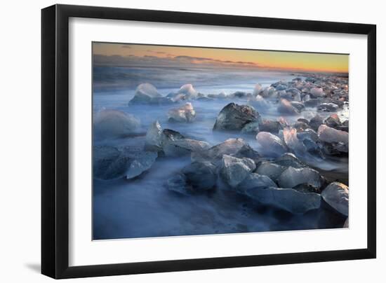 Pieces of glacial ice over black sand being washed by waves, Iceland-Raul Touzon-Framed Photographic Print