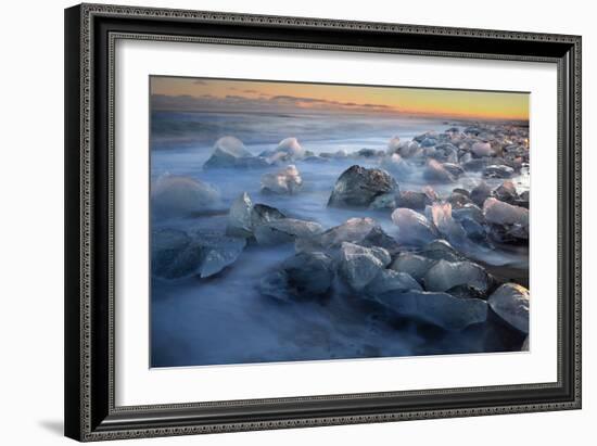 Pieces of glacial ice over black sand being washed by waves, Iceland-Raul Touzon-Framed Photographic Print