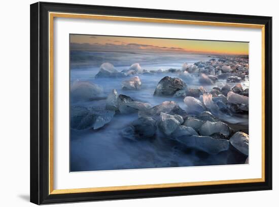 Pieces of glacial ice over black sand being washed by waves, Iceland-Raul Touzon-Framed Photographic Print