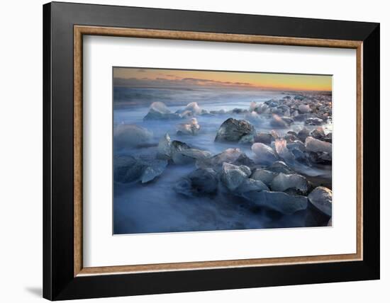 Pieces of glacial ice over black sand being washed by waves, Iceland-Raul Touzon-Framed Photographic Print