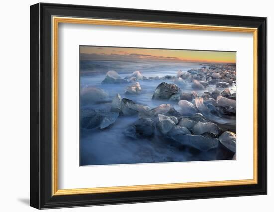 Pieces of glacial ice over black sand being washed by waves, Iceland-Raul Touzon-Framed Photographic Print