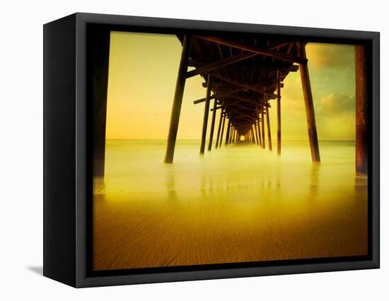 Pier over Golden Sand and Water-Jan Lakey-Framed Premier Image Canvas