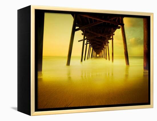 Pier over Golden Sand and Water-Jan Lakey-Framed Premier Image Canvas