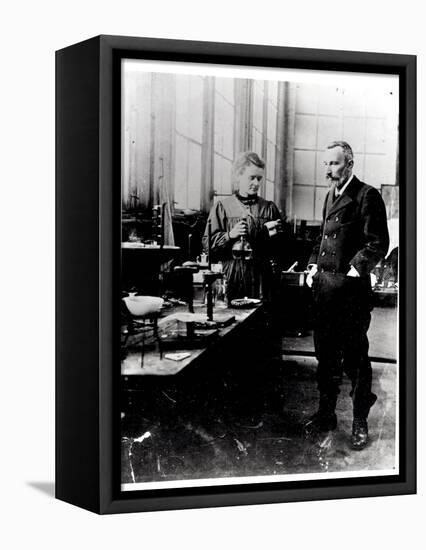 Pierre (1859-1906) and Marie Curie (1867-1934) in their Laboratory, c.1900-Valerian Gribayedoff-Framed Premier Image Canvas