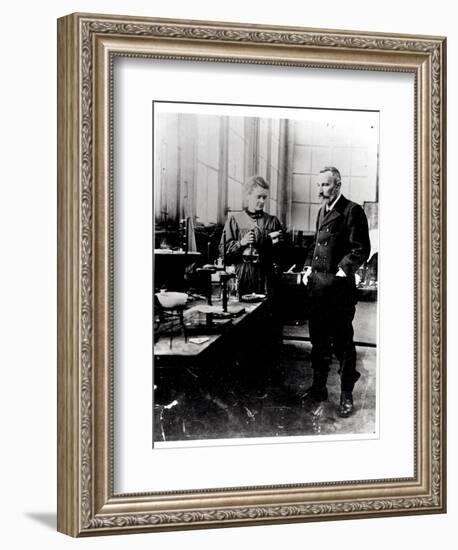 Pierre (1859-1906) and Marie Curie (1867-1934) in their Laboratory, c.1900-Valerian Gribayedoff-Framed Giclee Print