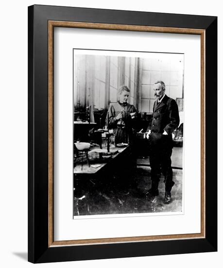 Pierre (1859-1906) and Marie Curie (1867-1934) in their Laboratory, c.1900-Valerian Gribayedoff-Framed Giclee Print